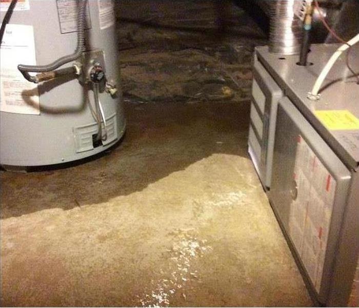 Floor flooded due to water heater leak