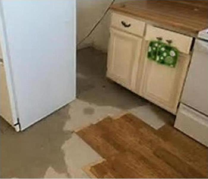 Kitchen with water damage.